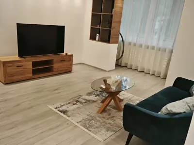 sufragerie apartament inchiriere Sector 1 București tv canapea